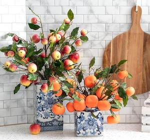 Add a vibrant touch of nature to your space with our Artificial Red Apple Spray and Persimmon Orange Spray Branches 🍎 🍊 

Our Red Apple spray features seven vivid red apples and our Orange Persimmon Spray features six persimmons on each branch, all meticulously detailed for a lifelike appearance.

You can also mix and match these sprays with other flowering fruits or blooms in complementary colours for a trendy ‘mixed media’ approach to florals.

Standing at 70cm tall, these sprays are sold individually.

SKU: 4737006RE, 4737005OR
.
.
#kochandco #kochinspo #artificialfruit #artificialfruitsdecor #artificialapple #artificialpersimmon