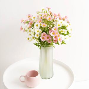 Daisies are such a cheerful flower, with their soft pink and white petals, they are perfect for adding a touch of natural beauty to any space.

They look delightful on their own whether they are displayed in a vase as a centrepiece or incorporated into a larger floral arrangement.

These delicate and pretty white and pink Daisy Sprays have a yellow centre with 15 flower heads. 

Measure 63cm in height.

SKU: 4711701WH & 4711701PK
.
.
#kochandco #kochinspo #artificialflowers #daisy #flowervases #glassvasedecor