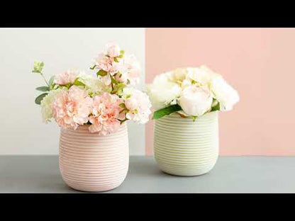 Check out our Ceramic Ribbed Belly Pots!