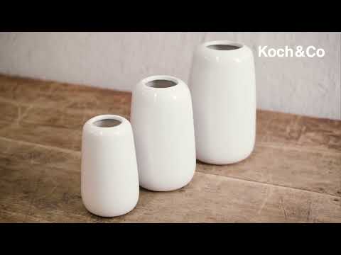 Check out our range of Ceramic Cone Vases in Glossy White!