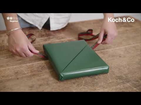 Learn how to wrap a gift with a Greeting Card Pocket