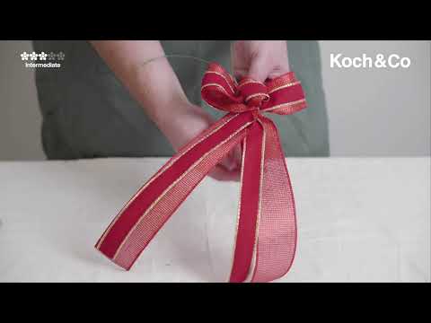 Learn how to make a bow using two different ribbons