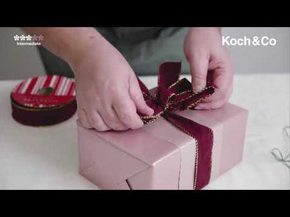 Learn how to make a bow using wide and narrow ribbons