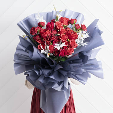 Red Roses in Blue Wrap