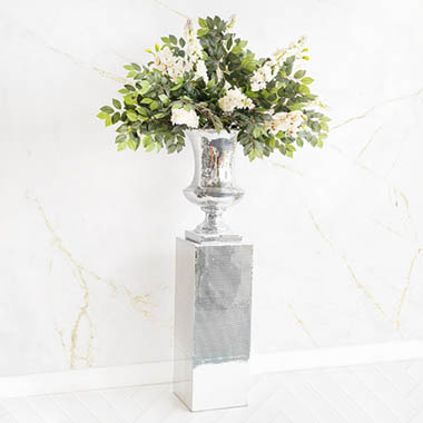 Luscious leaves and ivory fleurs urn arrangement