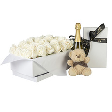 Interflora 24 white roses with chocolate, champagne, teddy