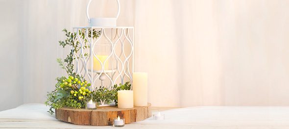 How to decorate flameless candles with candle lanterns.