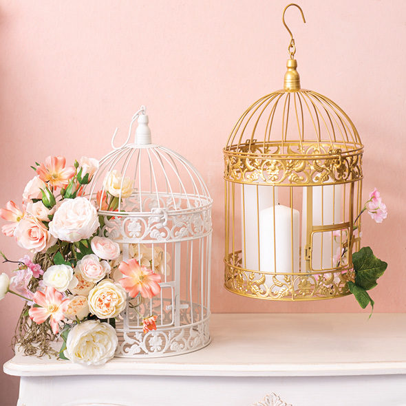 birdcage styling with candles and flowers
